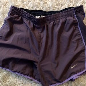 womens NIKE dark purple athletic shorts